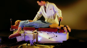 This is a picture of Cox Technic chiropratic spinal manipulation as performed at Chiropractic Solutions.